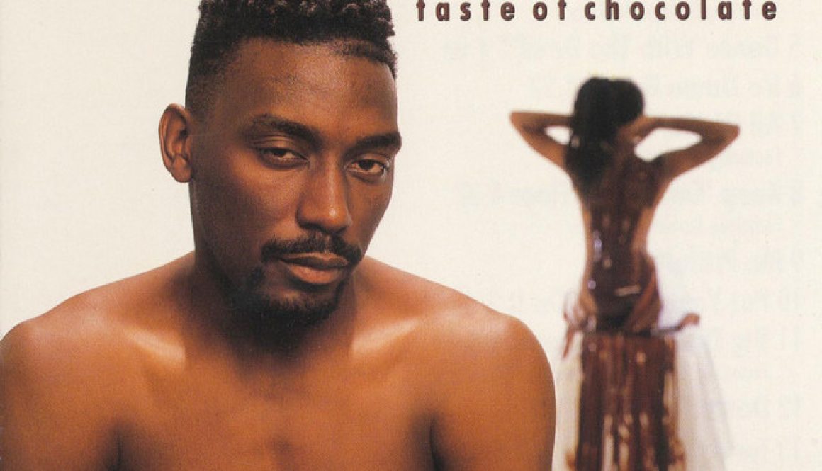 Album cover for Big Daddy Kane's 1990 release, Taste of Chocolate, featuring a close-up, dramatic portrait of the rapper with a high-top fade, emphasizing his "ladies' man" aesthetic.